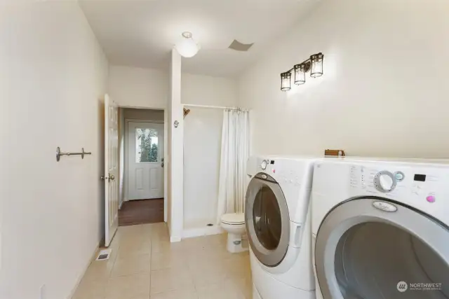 Utility room + 3/4 bath for those muddy days or place to wash a pet.