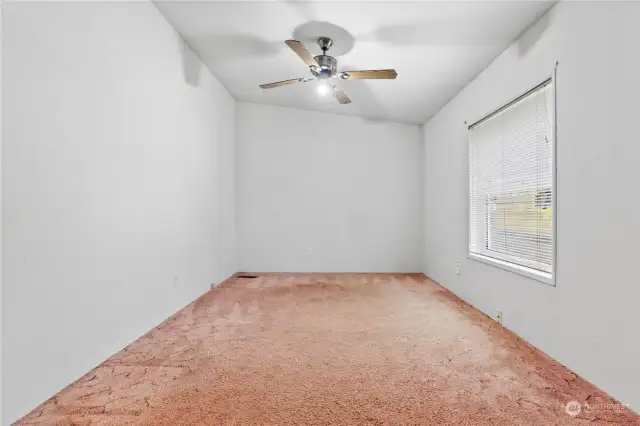 Bedroom #3 (Den w/Closet) w/Vaulted Ceilings and Ceiling Fan. Mini Blinds included.