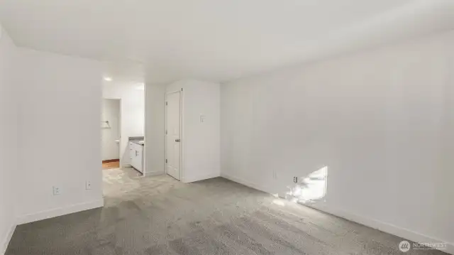 Adjacent to the guest bedroom is your spacious Primary Suite.