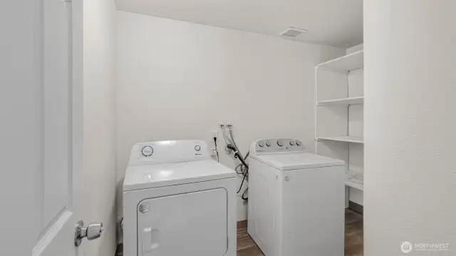Large utility room with storage & appliances stay!