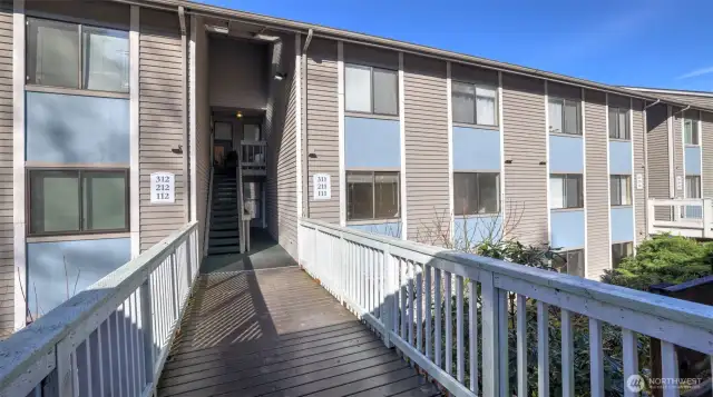 Unit R112 is a desirable end unit, conveniently located on the lower level for easy access.