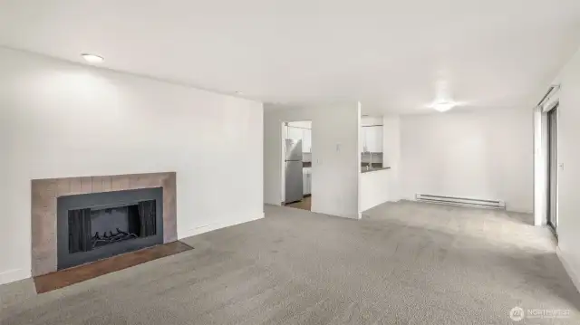 An open floorplan seamlessly flows into the dining area and kitchen.