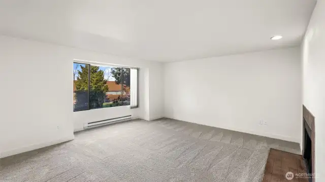 Another angle of the spacious living room.