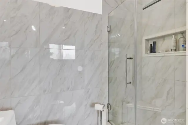 The walk-in shower has rain fall shower head and several jetted nozzles to wash away the stress.  The number of settings to chose from seem endless.