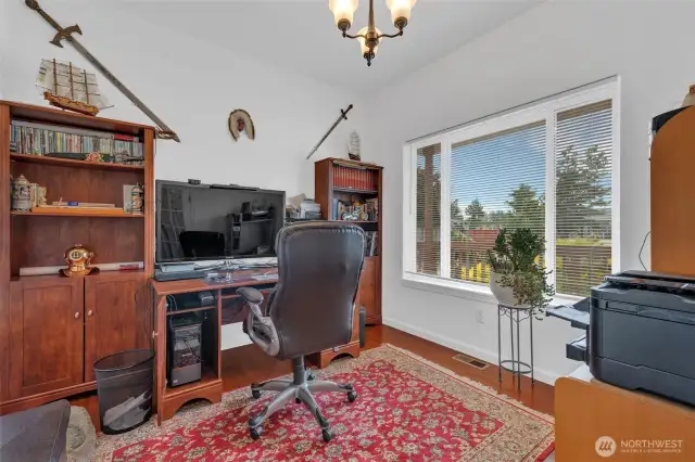 Dedicated office space with glass paneled French Doors.