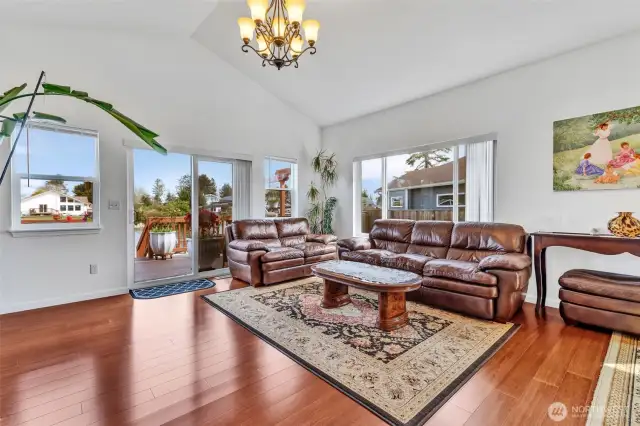 The living room is spacious and attracts tons of light. The ceilings are vaulted and the view to Duck Lake can be seen from anywhere in the room. Genuine hardwood flooring throughout the home gives it a warm feeling.