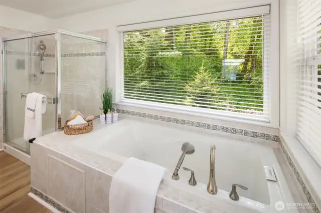 soak in tub overlooking backyard greenbelt