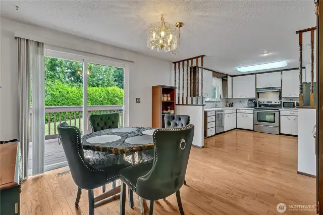 Kitchen and dining room with patio deck.