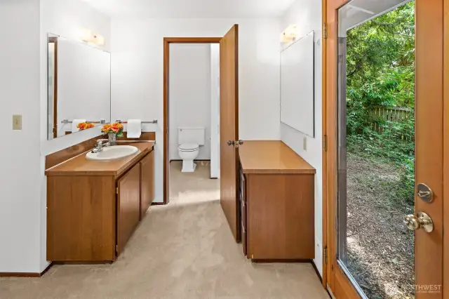 View of vanities and ensuite 3/4 bath in the Primary Bedroom