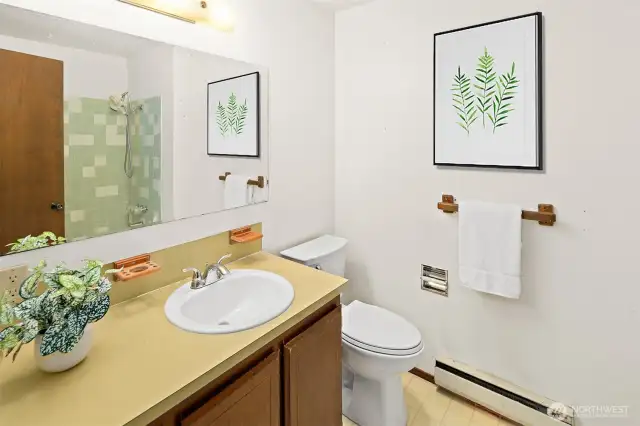 Virtually staged hallway full bathroom.