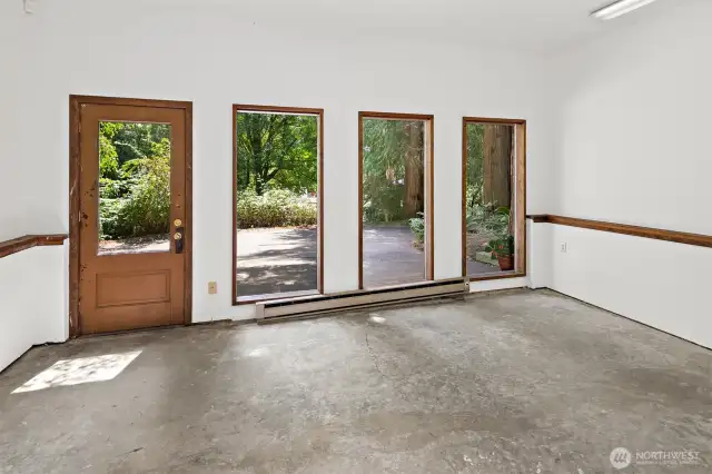 Garage converted to office/flex space.