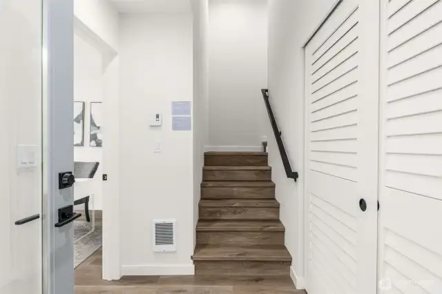 Welcoming entry with convenient storage, setting the tone for a refined interior.