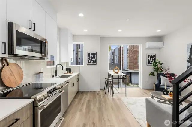 The heart of the home, with stainless steel appliances and streamlined cabinetry— for all your culinary adventures.