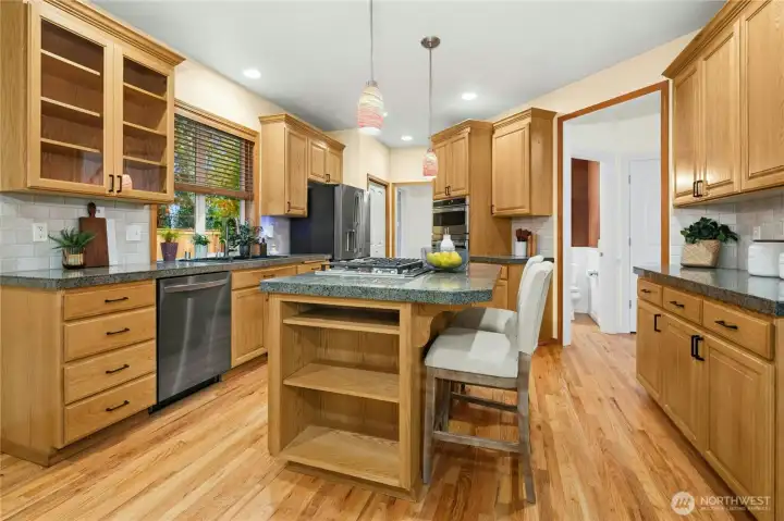 Extra storage in the island, & fine pendant lighting above