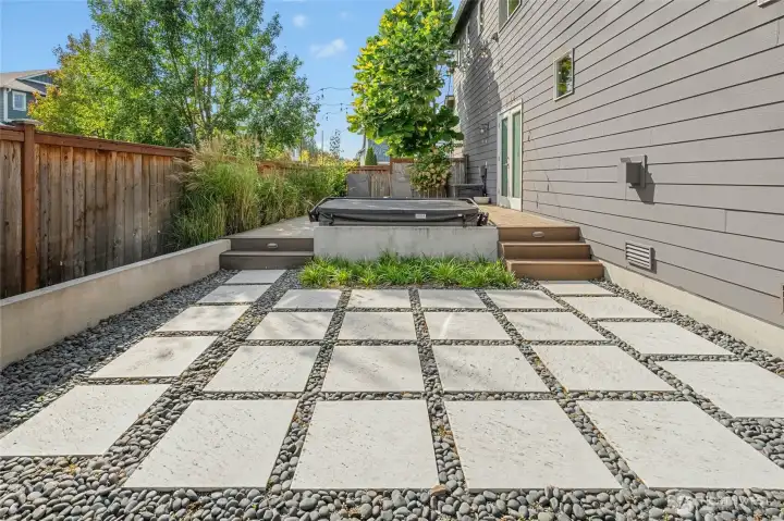 Zen hardscaping as you relax and unwind in the hot tub above