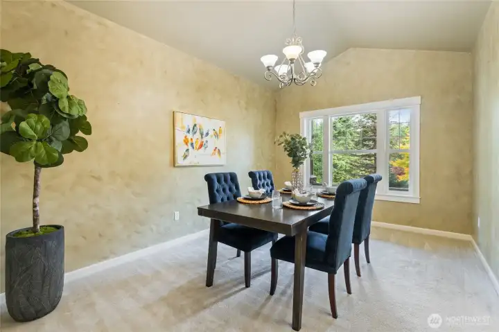 Formal dining room is spacious room for entertaining