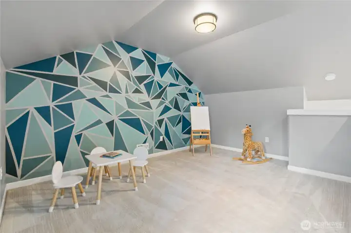 Three areas make this big bonus room able to handle multi uses
