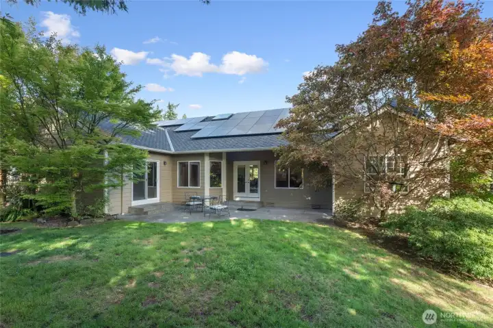 Backyard features cement patio with access from great room as well as primary suite