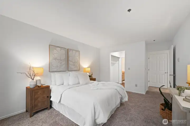 Primary bedroom with an en suite bathroom.