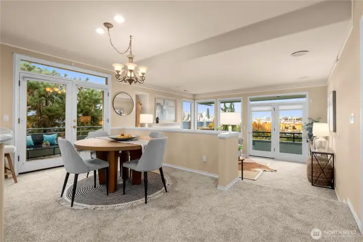 This photo shows the dining area of this open floor plan.