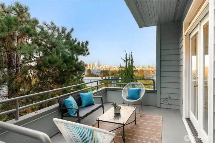 In addition to the other deck in the front, this deck on the side can accommodate a table or couch and is plumbed with gas for your BBQ grill.