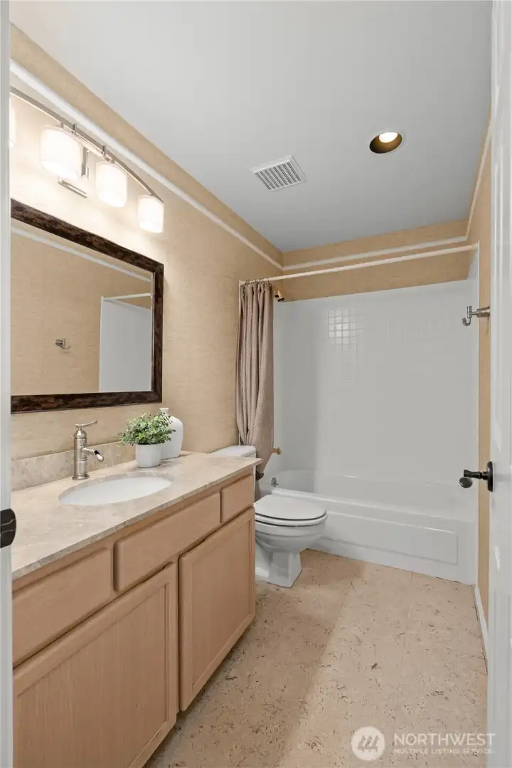 The second full bath is also spacious and updated!