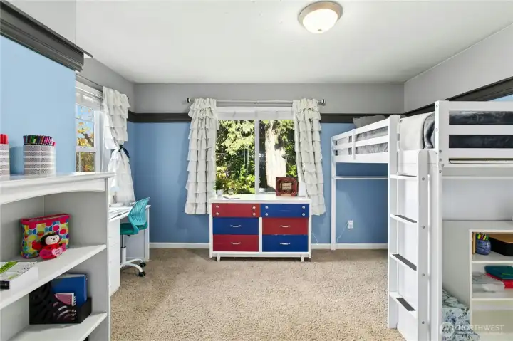 Bedroom Three:  Vibrant and full of light, this room offers plenty of space for creativity and relaxation. Its cheerful color palette and smart layout make it both stylish and functional.