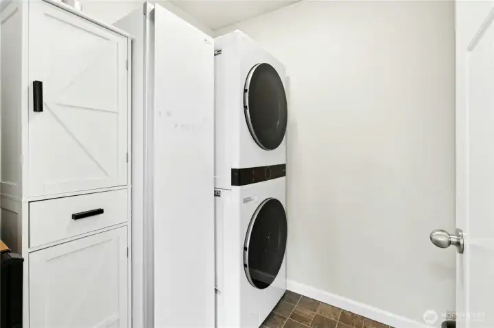 Upstairs Laundry Room:  Conveniently located near all the bedrooms, this modern laundry room makes washing and folding a breeze. Clean, efficient, and designed for everyday comfort.