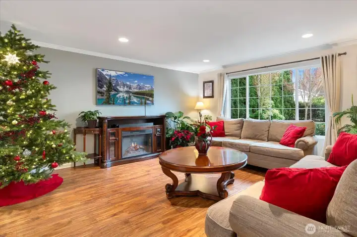 Engineered hardwood floors, natural light, so much room to entertain or settle in for a cozy evening.