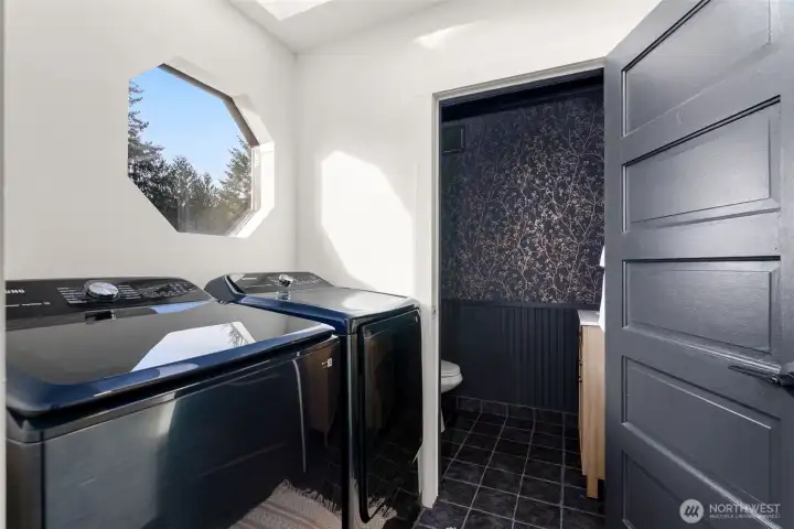 Mudroom/Utility room with half bath on main.