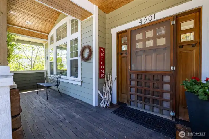 The covered front porch greets you in...