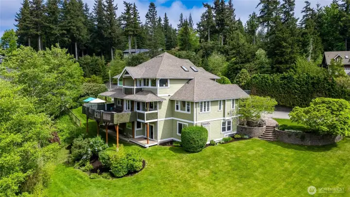 View of the home showcasing all three (3) decks