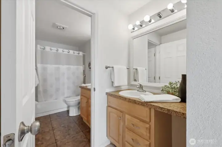 Enter full bath either from the primary bedroom, or from the hall way!  Such a nice added feature!