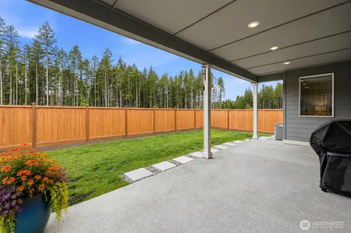 Huge covered patio perfect for summer  entertaining and  cookouts - virtually staged