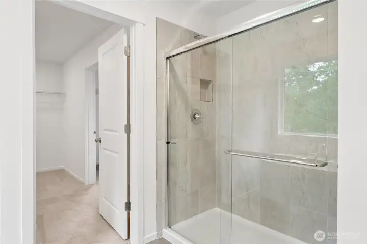 Bathroom leads to primary closet that connects to the laundry room! Bathroom leads to primary closet that connects to the laundry room!