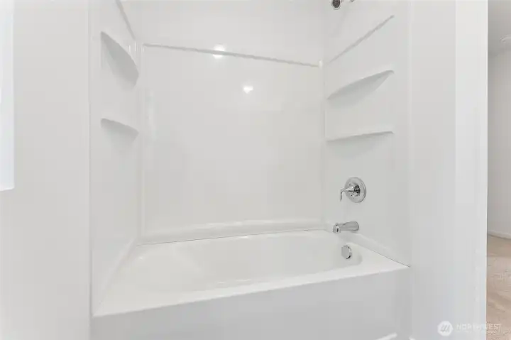Secondary bathroom feature a shower/tub combo. Secondary bathroom feature a shower/tub combo.