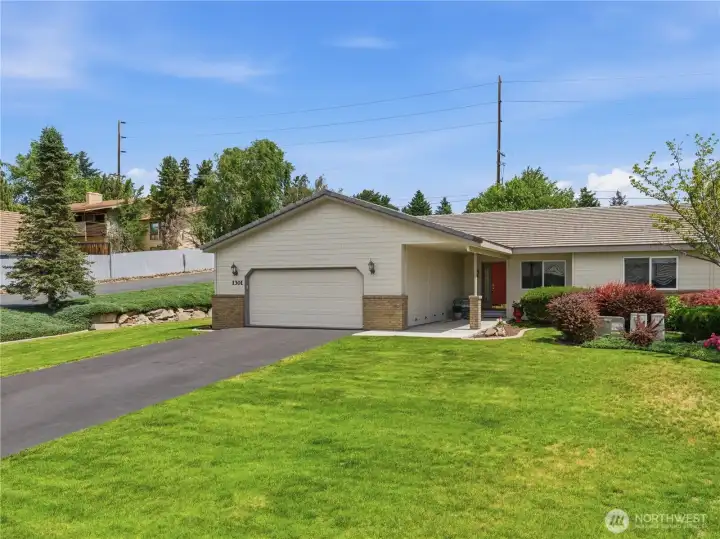Front of house with ample parking