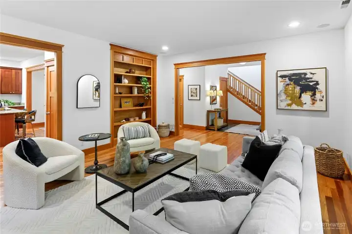 Warm wood trim work and built-in shelves add to the classic craftsman interior