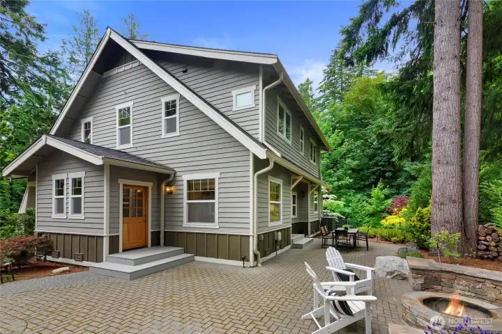 Pavers provide a level, flexible backyard area for entertaining and relaxing