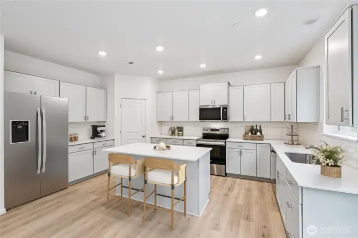 VIRTUALLY STAGED:Open concept living/dining kitchen