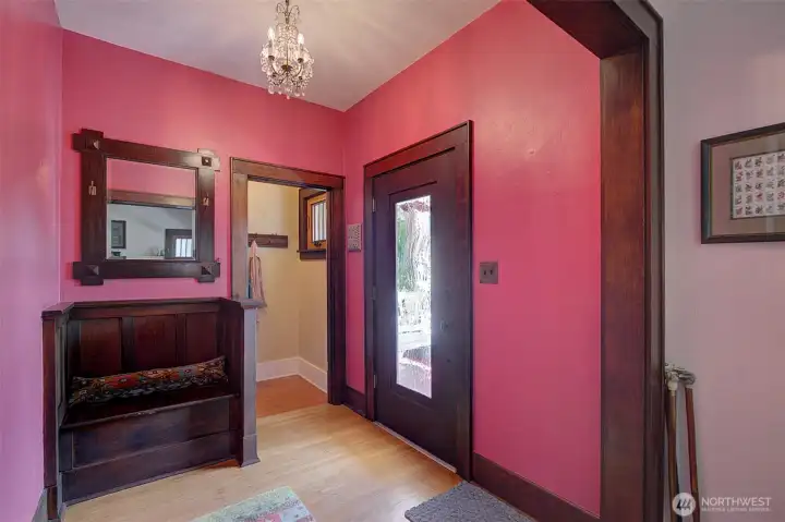 Beautiful entry with charming mahogany bench. Notice all the lovely trim too! Beautiful entry with charming mahogany bench. Notice all the lovely trim too!