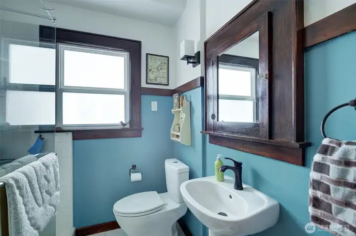 Main bath with updated shower. Main bath with updated shower.