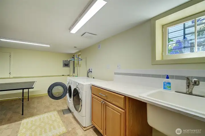 Lower level utility space, Great counter for folding cloths. Lower level utility space, Great counter for folding cloths.