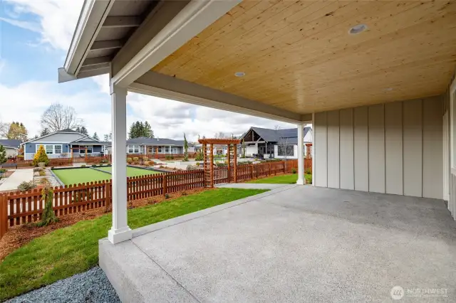 Large covered patio w/gas connection bordering the park.