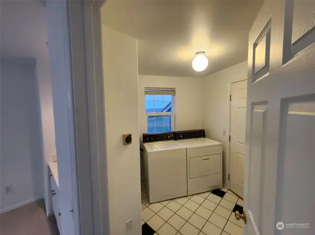 Laundry/utility and entrance to garage