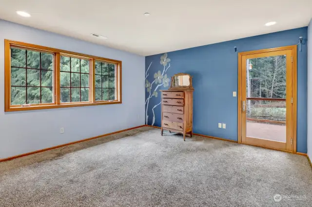 Upstairs bedroom with access to large deck.