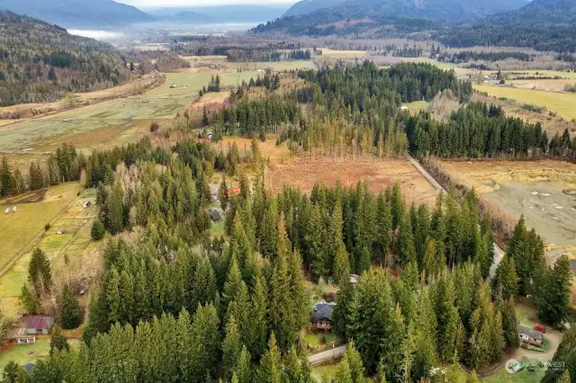 The beautiful South Fork Nooksack river valley. The home & property is shown on lower right along the corner of Doran Rd.