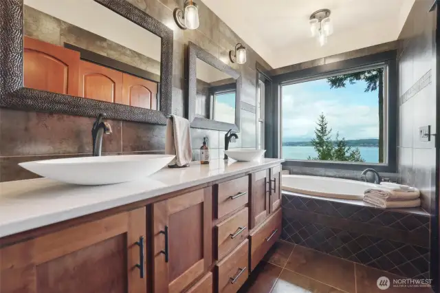 5-piece ensuite with private view, deep tub, double sinks and impressive shower.