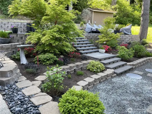 The terraced front yard is beautifully landscaped and a peaceful retreat.