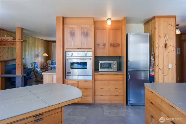 Other end of the kitchen with living room on the left.